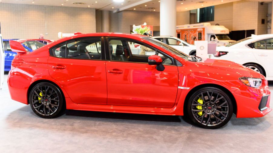 A new Subaru WRX STI on display at an auto show