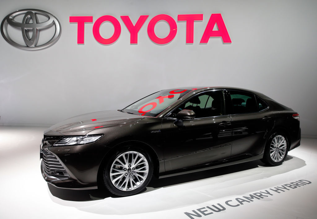 A new Toyota Camry hybrid automobile is on display during the second press day of the Paris Motor Show