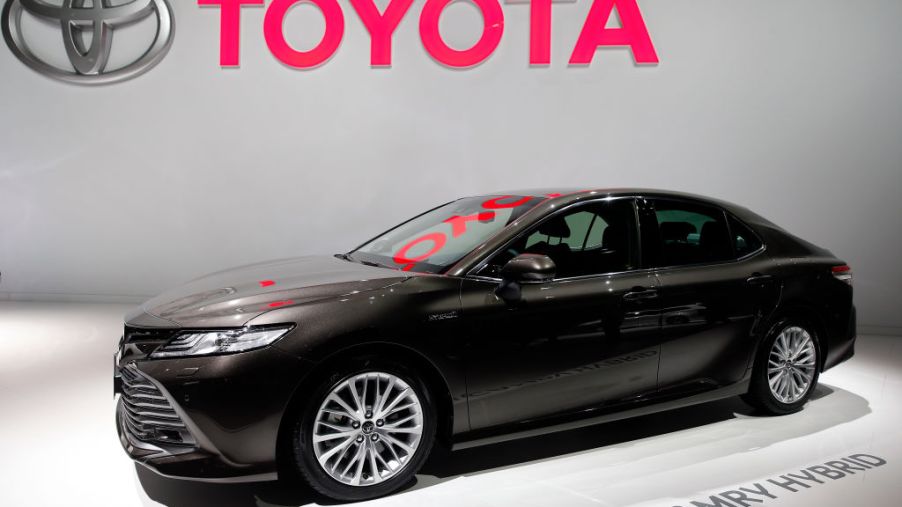A new Toyota Camry hybrid automobile is on display during the second press day of the Paris Motor Show