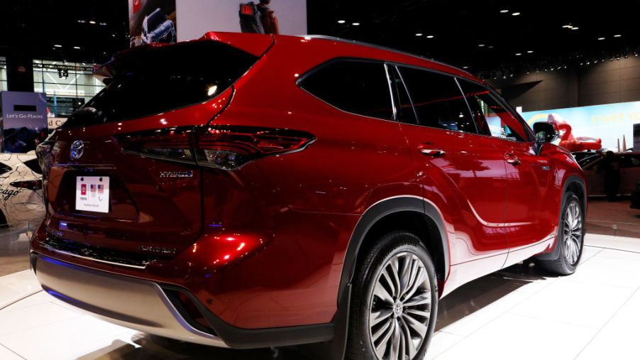A new Toyota Highlander Hybrid on display at an auto show