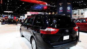 A Toyota Sienna minivan on display at an auto show