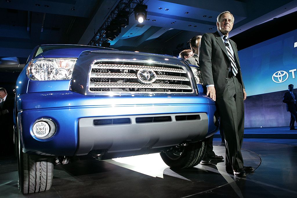 A man presenting a new Toyota Tundra at an auto show