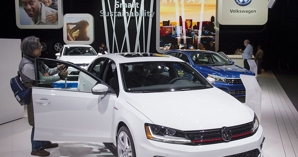 Attendees look at the the Volkswagen Jetta during the 2017 North American International Auto Show in Detroit, Michigan