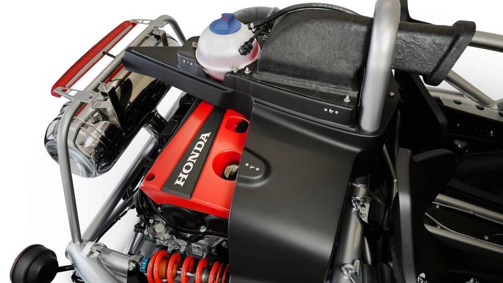 Shot of the Ariel Atom 4's Honda Civic Type R engine's red cover