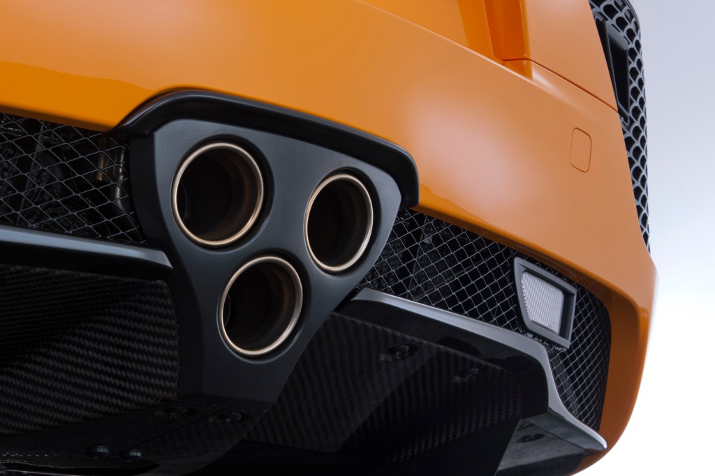 A close-up of the triple stacked triangular exhaust design of the 2012 Lexus LFA.