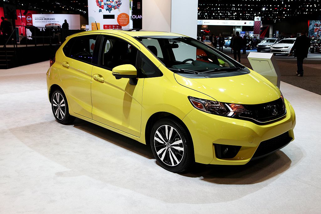 A 2015 Honda Fit on display at an auto show