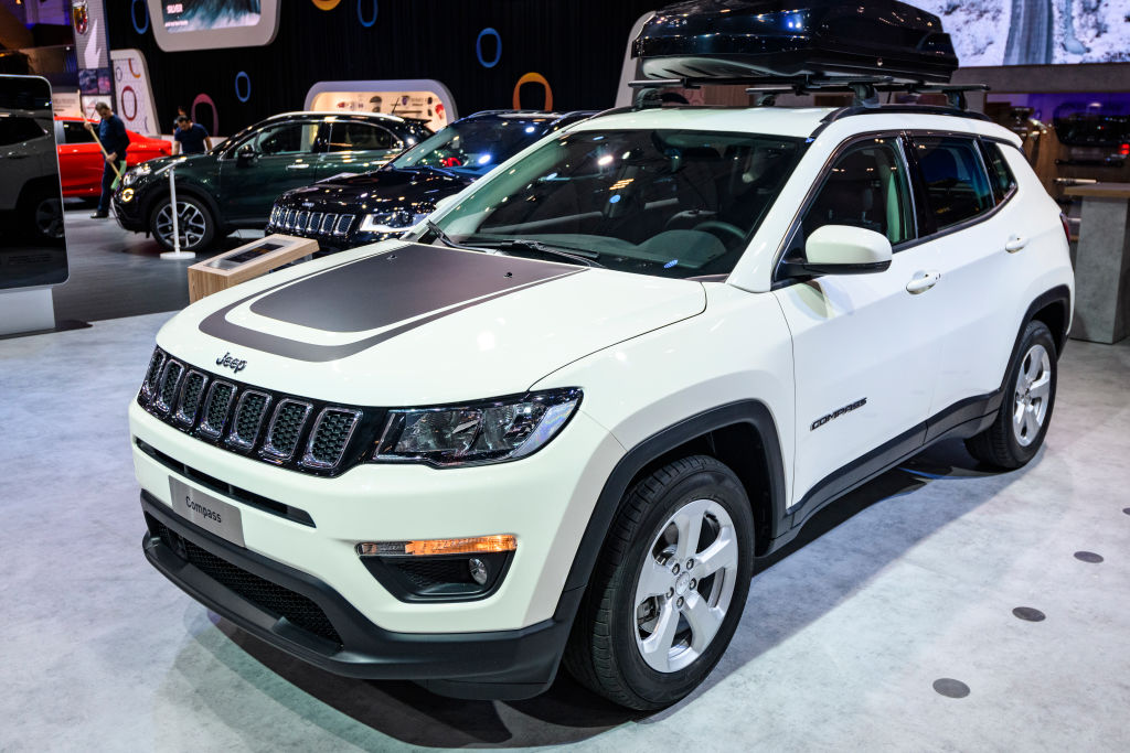 A 2020 Jeep Compass on display at an auto show