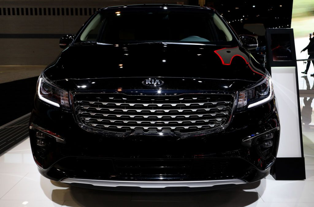 A Kia Sedona on display at an auto show