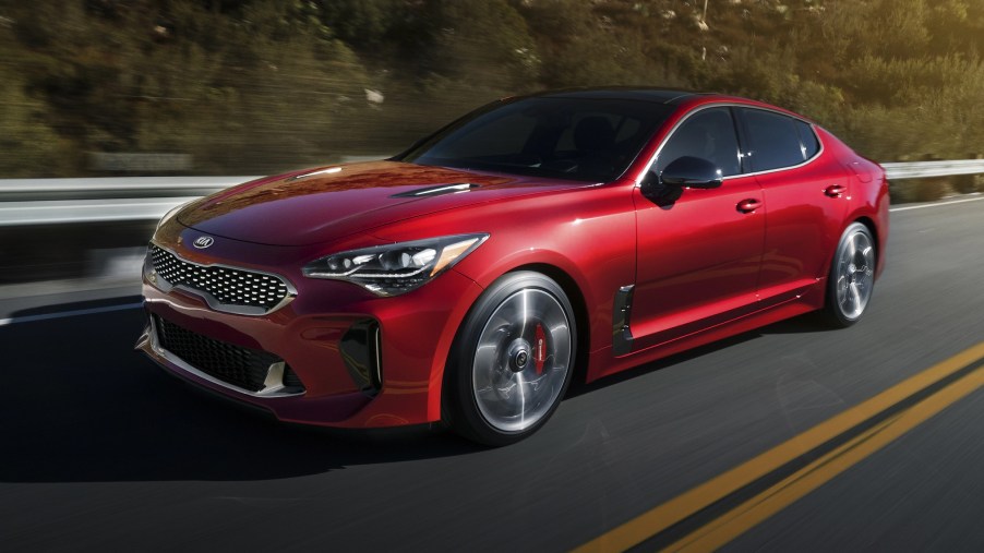 A red 2020 Kia Stinger on the track.