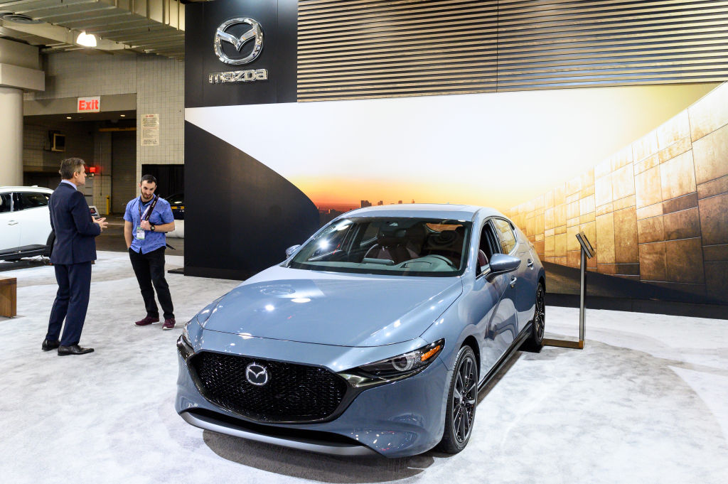 A new Mazda3 on display at an auto show