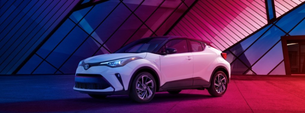 white 2020 Toyota C-HR in pink and blue lighting