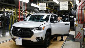 General Motors Chevrolet Traverse and Buick Enclave vehicles go through the assembly line at the General Motors Lansing Delta Township Assembly Plant