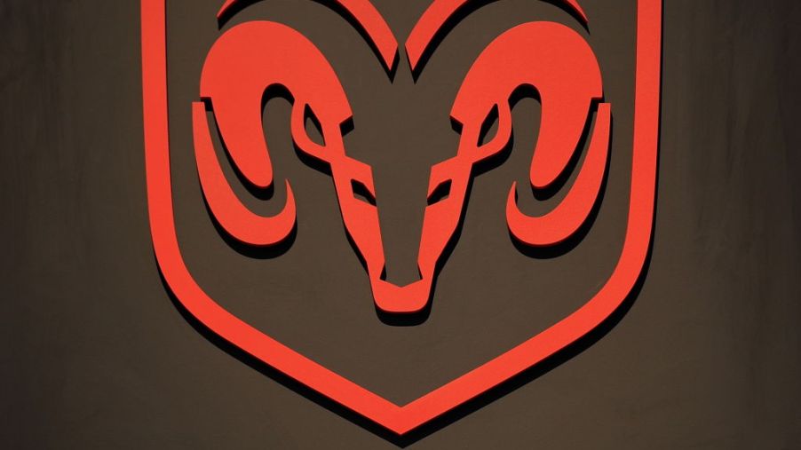 A Dodge Logo on display at an auto show