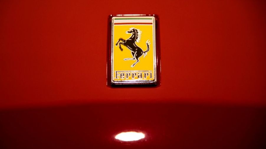 A Ferrari logo on the hood of a car