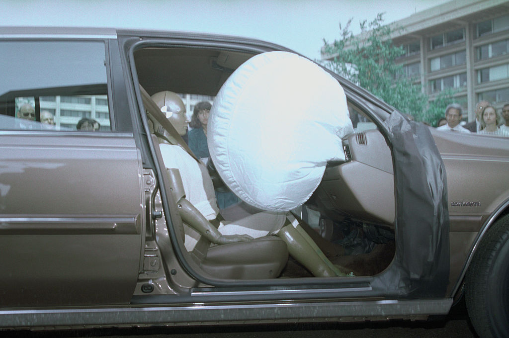 An airbag test being performed on a Ford car