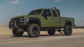 Green and lifted 1993 Chevy Pickup