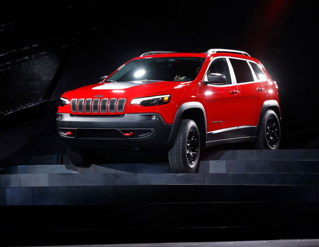 A 2019 Jeep Cherokee on display at an auto show
