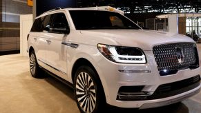A Lincoln Navigator on display at an auto show