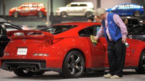 Wayne Williams shines a cherry red Nissan 350Z NISMO