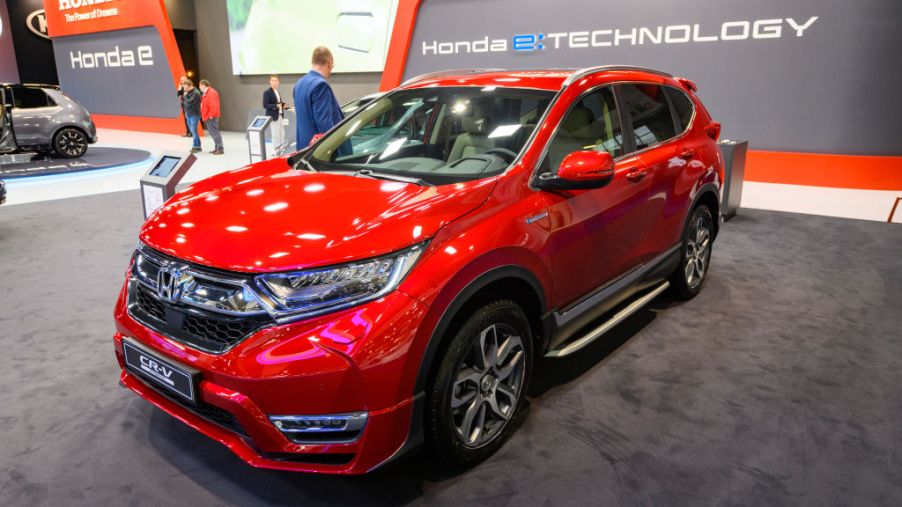 A red Honda CR-V on displat at an auto show