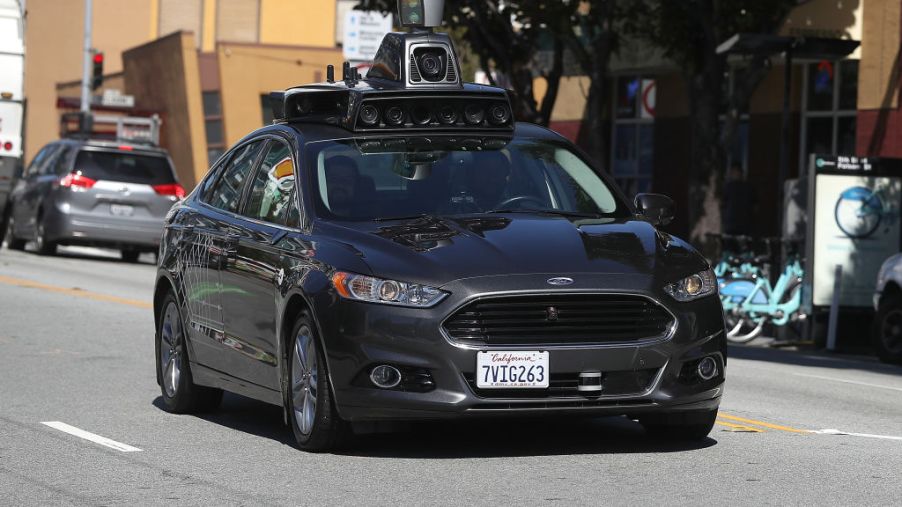 A self-driving car riding down the street