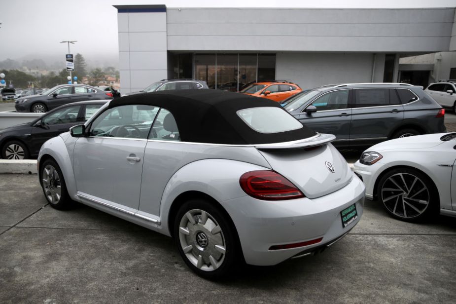 A brand new convertible Volkswagen Beetle is displayed on the sales lot at Serramonte Volkswagen