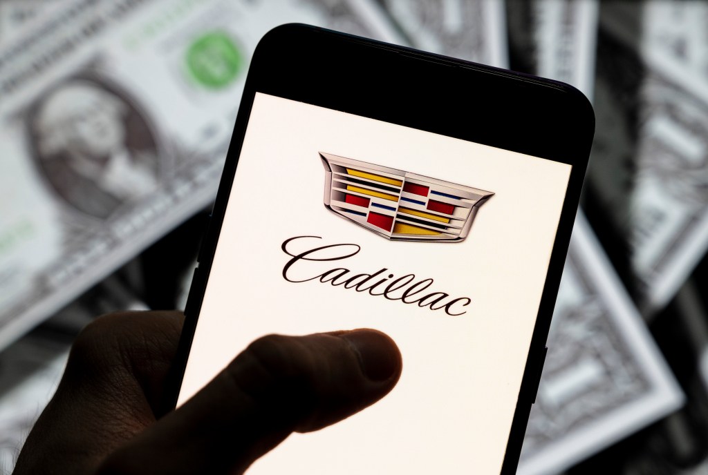 Cadillac badge displayed on a smart phone