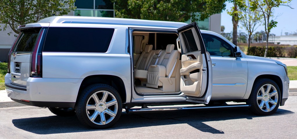 Tom Brady's 2018 Stretched Becker Cadillac Escalade ESV with the rear door open for a peek at the plush interior