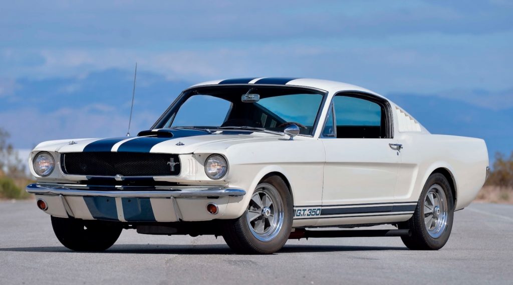 Exterior shot of 1965 Ford Shelby GT350 Mustang Paxton prototype with white paint and blue racing stripes
