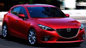 Bright red Mazda in drive mode.