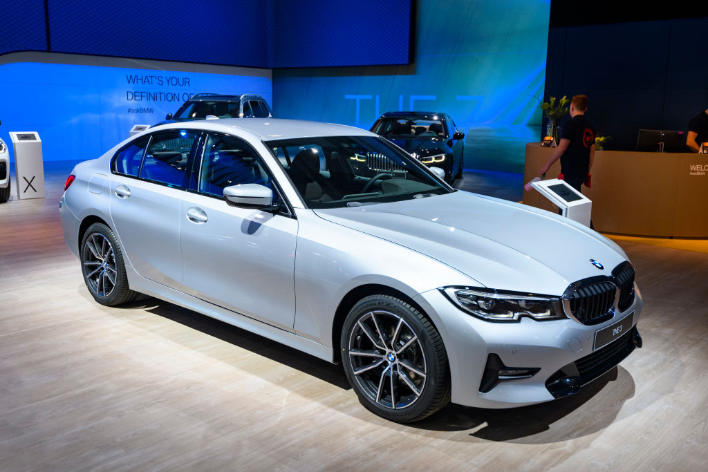 A 2020 BMW 3 Series on display at an auto show
