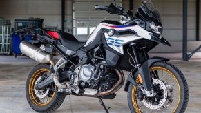 2020 BMW F 850 GS Adventure with white, red, and blue livery parked in hangar