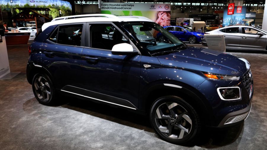 A 2020 Hyundai Venue on display at an auto show