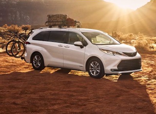 a new white Toyota Sienna with the sun shine in the bareback ride