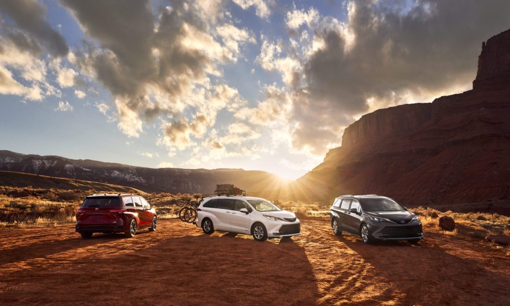 red, white, and silver 2021 Toyota Siennas in the desert