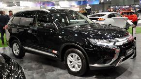 A new Mitsubishi Outlander on display at an auto show