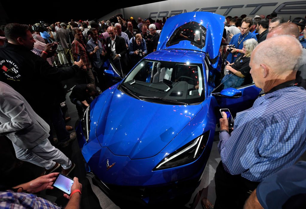 People take a closer look after the unveiling of the 2020 mid-engine C8 Corvette Stingray