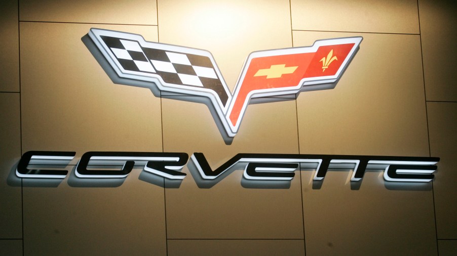 The Corvette logo was into a wall hanging and is spotlighted from above