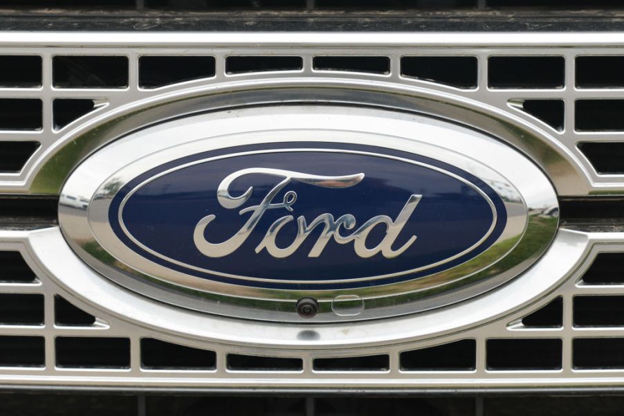 A Ford logo on the front of a pickup truck