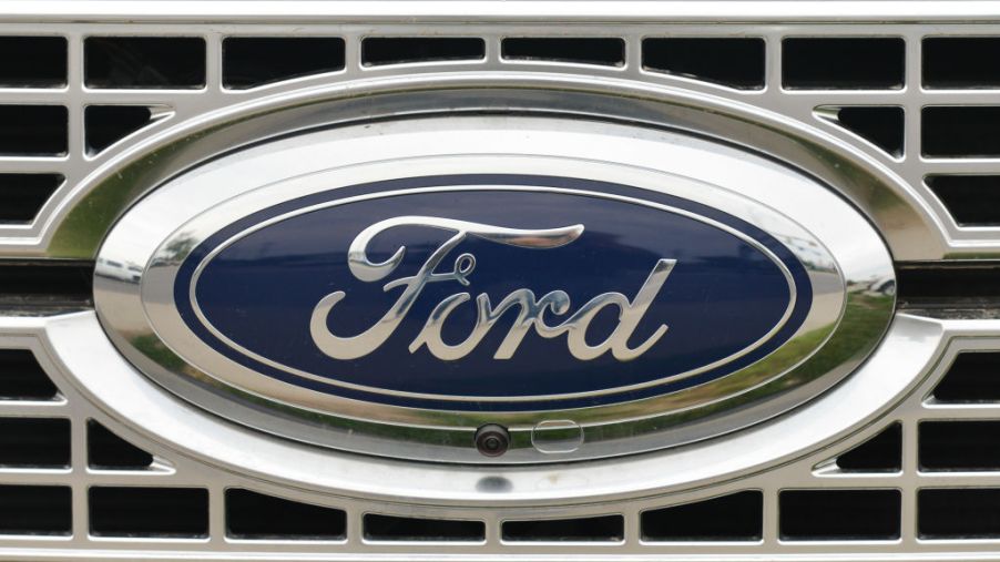 A Ford logo on the front of a pickup truck