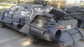 rear 3/4 view of an arbitrary apocalyptic sedan for Freak Show Friday