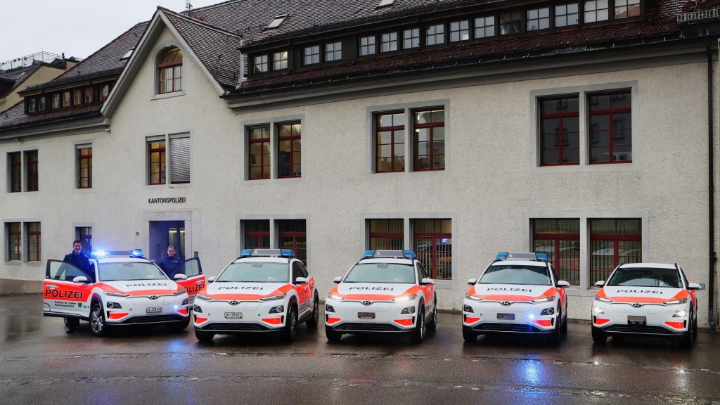Hyundai Kona Electric Police Cars lined up in front of a station in Switzerland