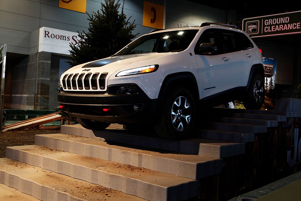 A Jeep Cherokee makes its way through the 'Camp Jeep Test Track' at the 108th Annual Chicago Auto Show