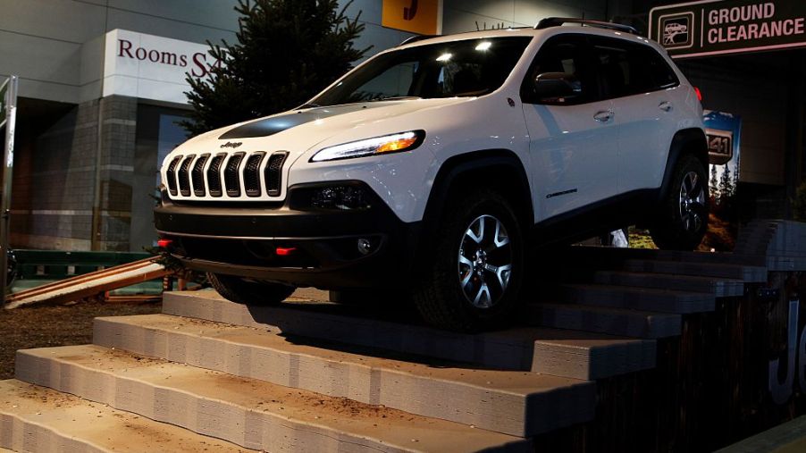A Jeep Cherokee makes its way through the 'Camp Jeep Test Track' at the 108th Annual Chicago Auto Show