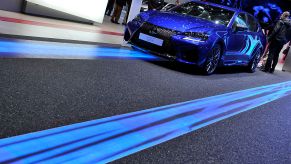 A Lexus GS F is displayed during the Geneva Motor Show