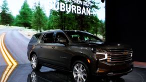 A 2021 Chevy Suburban on display at an auto show