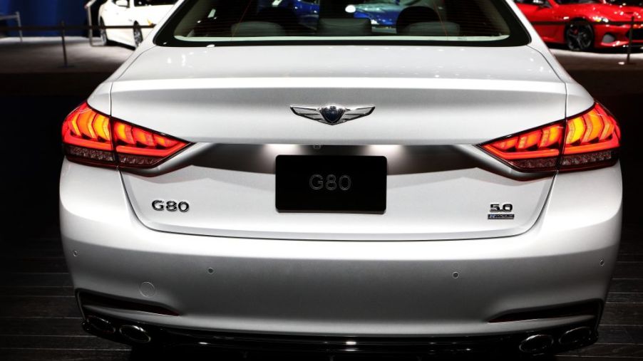 A Genesis G80 luxury car on display at an auto show