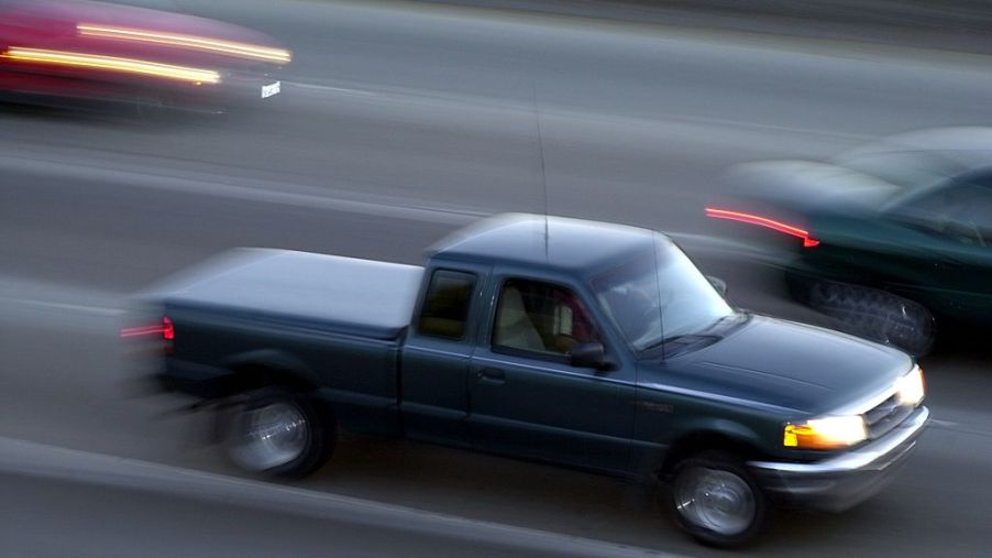 A Ford Ranger truck rushes through "The Orange Crush" freeway intersection in Orange, CA,