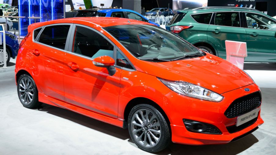 A red Ford Fiesta on display at an auto show