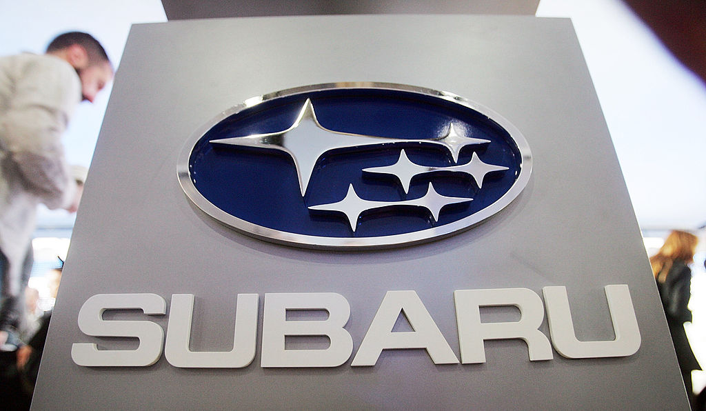A sign displaying the Subaru logo on display